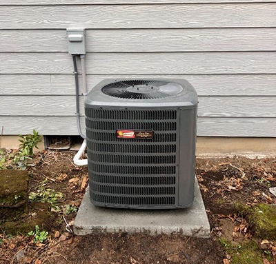 AC unit installed outside of a house